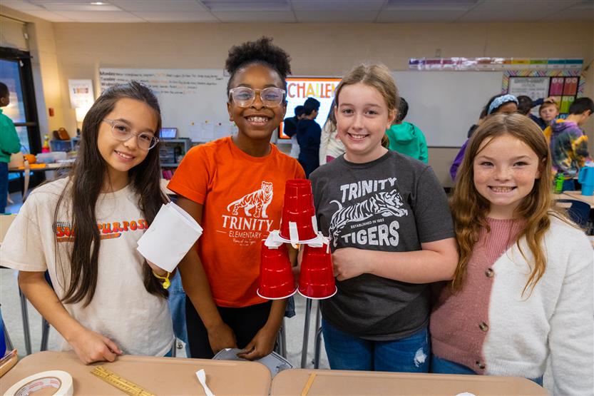 Students do a pumpkin STEM challenge